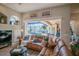 Cozy living room that looks onto the backyard, with a pool and patio at 16331 Burniston Dr, Tampa, FL 33647