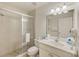 Modern bathroom with a glass-enclosed shower, stylish vanity, and pristine fixtures for a spa-like feel at 19417 Gulf Blvd # D-206, Indian Shores, FL 33785