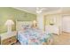 Tranquil bedroom featuring a comfortable bed, tasteful decor, and a serene atmosphere for relaxation at 19417 Gulf Blvd # D-206, Indian Shores, FL 33785