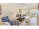 Cozy living room with comfortable seating and bright decor in a coastal style condo at 19417 Gulf Blvd # D-206, Indian Shores, FL 33785