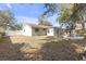 Expansive backyard offers ample space for outdoor activities, relaxation and entertaining guests at 245 Faithway Dr, Seffner, FL 33584