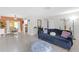 Bright living room with a dining area and a comfortable sofa at 245 Faithway Dr, Seffner, FL 33584