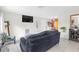 Spacious living room with a large window and plenty of natural light at 245 Faithway Dr, Seffner, FL 33584