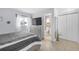 View of main bedroom showing bed and a bathroom with a linen closet at 245 Faithway Dr, Seffner, FL 33584