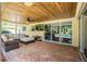 Inviting outdoor space with a covered seating area and a view of the pool at 306 Indian Rocks S Rd, Largo, FL 33770