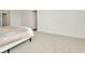 Bright bedroom featuring neutral carpeting and base molding at 31818 Treasure Dock Isle, Wesley Chapel, FL 33545