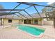 Inviting pool with screened enclosure and brick-paved patio for lounging at 3917 Appletree Dr, Valrico, FL 33594