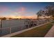 Beautiful waterfront view from a private dock with boat lifts and stunning sunset colors at 3961 12Th Ne St, St Petersburg, FL 33703