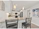 Bright and airy kitchen featuring a breakfast bar and views into the living spaces at 3961 12Th Ne St, St Petersburg, FL 33703