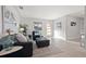 Cozy living room featuring stylish decor, neutral color palette, and lots of natural light at 3961 12Th Ne St, St Petersburg, FL 33703
