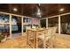 Covered patio with waterfront view, dining table, and outdoor dining area at 3961 12Th Ne St, St Petersburg, FL 33703