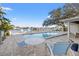 Backyard pool area with comfortable seating and picturesque waterfront views at 3961 12Th Ne St, St Petersburg, FL 33703
