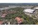 Scenic aerial view of community near commercial area, showcasing lush landscaping and picturesque surroundings at 4106 Central Sarasota Pkwy # 1023, Sarasota, FL 34238