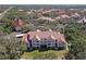Bird's eye aerial of the community surrounded by green trees at 4106 Central Sarasota Pkwy # 1023, Sarasota, FL 34238