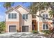 Charming condo with dual garages, private stairs, and a classic tile roof at 4106 Central Sarasota Pkwy # 1023, Sarasota, FL 34238