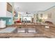 The kitchen features a double stainless steel sink and a view into the well-lit living area at 4106 Central Sarasota Pkwy # 1023, Sarasota, FL 34238