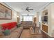 Comfortable living room featuring lots of light, ceiling fan, and neutral colored furniture at 4106 Central Sarasota Pkwy # 1023, Sarasota, FL 34238