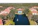 Scenic aerial view featuring community pool and fountain pond, an inviting outdoor oasis at 4106 Central Sarasota Pkwy # 1023, Sarasota, FL 34238