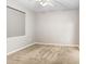 Neutral bedroom with ceiling fan and large window at 4512 Paper Mulberry Pl, Riverview, FL 33578