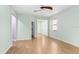 Spacious living room with ample natural light and ceiling fan at 4512 Paper Mulberry Pl, Riverview, FL 33578