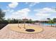 Community splash pad features a water umbrella and other fun water features for  at 4512 Paper Mulberry Pl, Riverview, FL 33578