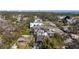 Aerial view of a tree-lined luxury neighborhood with waterfront views and mature landscaping at 6223 Bayshore Blvd, Tampa, FL 33611
