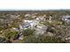 Aerial view of a luxury neighborhood with modern homes, green spaces, and tree-lined streets at 6223 Bayshore Blvd, Tampa, FL 33611