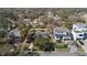 Aerial view of the property showcasing the home, landscaping, and neighborhood at 6223 Bayshore Blvd, Tampa, FL 33611