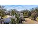 View of a private backyard with mature trees at 6223 Bayshore Blvd, Tampa, FL 33611