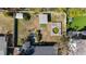 Aerial view of a large backyard featuring a shed, unique circular hot tub, and a deck at 6223 Bayshore Blvd, Tampa, FL 33611