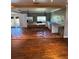 Open kitchen featuring concrete countertops, stainless steel appliances, and unique tile flooring at 6223 Bayshore Blvd, Tampa, FL 33611