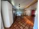 Open kitchen featuring concrete countertops, stainless steel appliances, and unique tile flooring at 6223 Bayshore Blvd, Tampa, FL 33611
