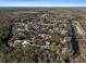 Panoramic aerial view of a waterfront community, featuring picturesque canals and lush surroundings, offering prime water access at 6291 Sebring St, Weeki Wachee, FL 34607