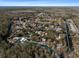 Ariel view displaying the home and surrounding landscape, and proximity to the tranquil river and lush greenery at 6291 Sebring St, Weeki Wachee, FL 34607