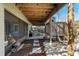 Under the porch of a backyard with wood beams, kayaks, and wooden stairs to the upper level at 6291 Sebring St, Weeki Wachee, FL 34607