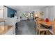 Open basement area features an entertainment area and dining area with a cozy atmosphere at 6291 Sebring St, Weeki Wachee, FL 34607