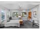 Cozy bedroom featuring neutral walls, a comfortable bed, and plenty of natural light at 6291 Sebring St, Weeki Wachee, FL 34607