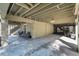 Ground level of the elevated home showing a carport and access to the screened in porch at 6291 Sebring St, Weeki Wachee, FL 34607