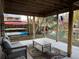 Relaxing covered patio with comfortable seating and stunning river views at 6291 Sebring St, Weeki Wachee, FL 34607