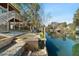 Stunning waterfront deck with a table and chairs to enjoy the views, overlooking the calm waters at 6291 Sebring St, Weeki Wachee, FL 34607