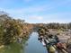 Scenic canal-front property featuring lush landscaping and private docks, perfect for boating and waterfront living at 6291 Sebring St, Weeki Wachee, FL 34607