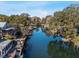 Waterfront view of a canal with mature trees lining the shore at 6291 Sebring St, Weeki Wachee, FL 34607