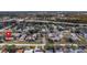 Aerial view showcasing the community, nearby highway access, and lush green surroundings at 6303 23Rd N St, St Petersburg, FL 33702