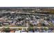 Aerial view showcasing the community, nearby highway access, and lush green surroundings at 6303 23Rd N St, St Petersburg, FL 33702