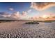 Expansive sandy beach perfect for sunbathing, swimming, and enjoying the ocean breeze at 6500 Sunset Way # 202, St Pete Beach, FL 33706