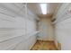 Walk-in closet with ample shelving for storage at 6500 Sunset Way # 202, St Pete Beach, FL 33706