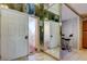 Bright condominium foyer features mirrored walls and unique design elements with access to the breakfast nook at 6500 Sunset Way # 202, St Pete Beach, FL 33706