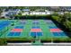 Aerial view of the community pickleball courts, offering a fun and active lifestyle at 6500 Sunset Way # 202, St Pete Beach, FL 33706