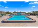 Community pool featuring clear water, seating, and an ocean-themed mural, perfect for leisure at 652 Boca Ciega Point N Blvd, St Petersburg, FL 33708