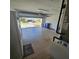 Spacious two-car garage with ample storage space, featuring an automatic door opener at 920 Regal Manor Way, Sun City Center, FL 33573